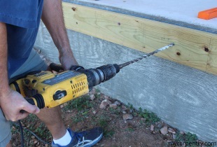 Attaching the Cedar Deck Leger to the concrete slab
